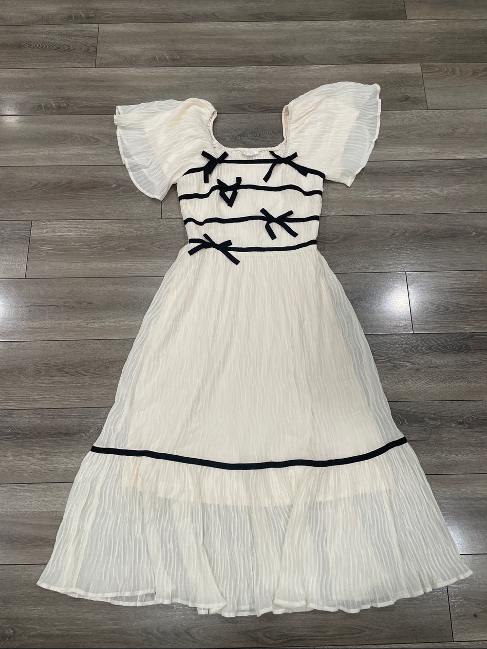 Ivory Midi Dress with Black Trim and Bow Details